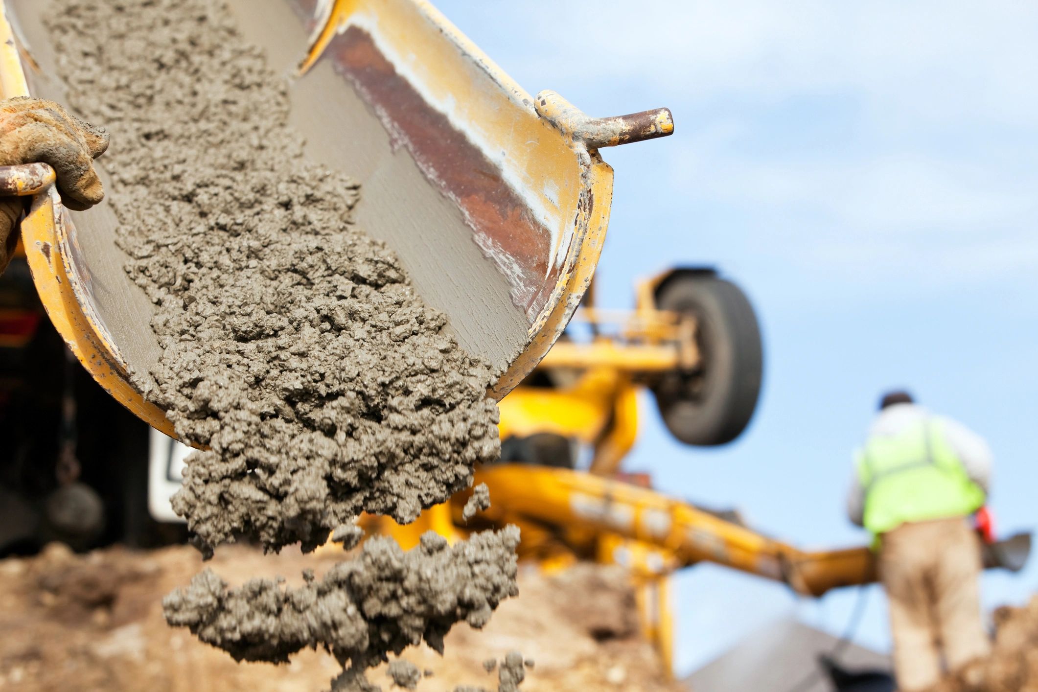 workers pouring concrete commercial